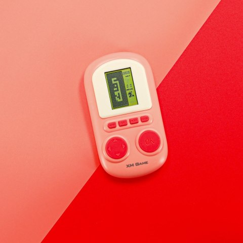 Gra elektroniczna zręcznościowa mini konsola przenośna kieszonkowa różowa Kik Sp. z o. o. Sp. k.